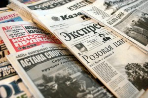 Russian and Kazakh language newspapers and magazines are displayed at a newsstand in Astana, Kazakhstan, on June 7, 2006.