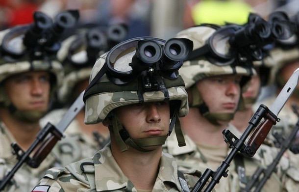 Polish soldiers take part in the Polish National Army Day parade in Warsaw August 15, 2008. The parade commemorates the battle for Warsaw, which took place in 1920, when Polish forces defeated the advancing Red Army. REUTERS/Kacper Pempel (POLAND)