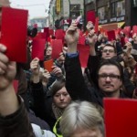 141117191657_prague_demo_red_cards_624x351_getty