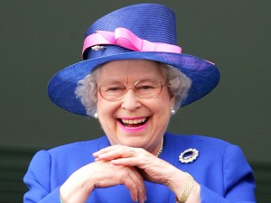 Queen Elizabeth II watches as Jockey Frankie Detorri crosses the finish line to win the Vodafone Derby with Irish horse Authorized on the second day of the annual Vodafone Derby horse race at Epsom Downs, Surrey, 02 June 2007. AFP PHOTO/CARL DE SOUZA.