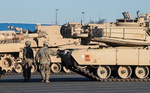 US tanks are unloaded from the transport ship "Resolve" in Bremerhaven, Germany, 6 January 2017. For the US operation "Atlantic Resolve" the US brigades are shipping military equipments towards Poland in order to secure the eastern European NATO countries. Photo: Ingo Wagner/dpa