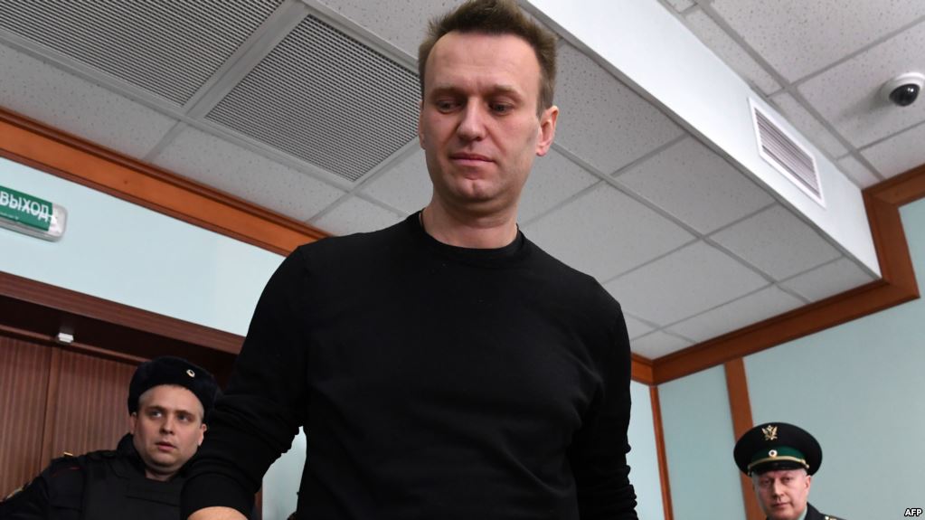 Kremlin critic Alexei Navalny, who was arrested during March 26 anti-corruption rally, attends an appeal hearing at a court in Moscow on March 30, 2017. A Russian court on March 27 sentenced Kremlin critic Alexei Navalny to 15 days behind bars after ruling that he had resisted police during a massive anti-corruption protest Sunday in Moscow. / AFP PHOTO / Kirill KUDRYAVTSEV