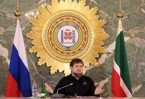 In this photo taken on Monday, Dec.  28, 2015, Chechen regional leader Ramzan Kadyrov speaks to journalists in Chechnya's provincial capital Grozny, Russia. Russian investigators are expected to indict five men with the murder of opposition leader Boris Nemtsov, a brazen killing which sent shockwaves among the opposition earlier this year. Nemtsov, a top opponent of Russian President Vladimir Putin, was shot late at night on Feb. 27 as he was walking just outside the Kremlin. Five Chechen men have been arrested on charges of involvement in the killing, but it has remained unclear who ordered the attack. The key suspect in Nemtsov's killing was a senior officer in the security forces of Chechen leader Ramzan Kadyrov while the organizer named by the investigators was a personal driver of senior commander and Kadyrov ally Ruslan Geremeyev. (AP Photo/ Musa Sadulaayev)