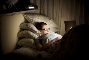 getty_rm_photo_of_teen_sitting_up_late_on_computer