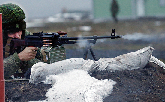 ROSTOV REGION, RUSSIA - DECEMBER 9, 2016: A Russian serviceman shoots a rifle during combat training exercises held by the 150th Rifle Division of the Russian Southern Military District at Kadamovsky Range. The division was re-established in 2016. Valery Matytsin/TASS Россия. Ростовская область. 9 декабря 2016. Военнослужащий вновь созданной 150-й мотострелковой дивизии во время занятий по боевой подготовке на полигоне "Кадамовский". Валерий Матыцин/ТАСС